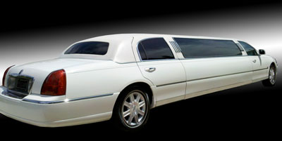 White Nine Passenger Lincoln Limousine